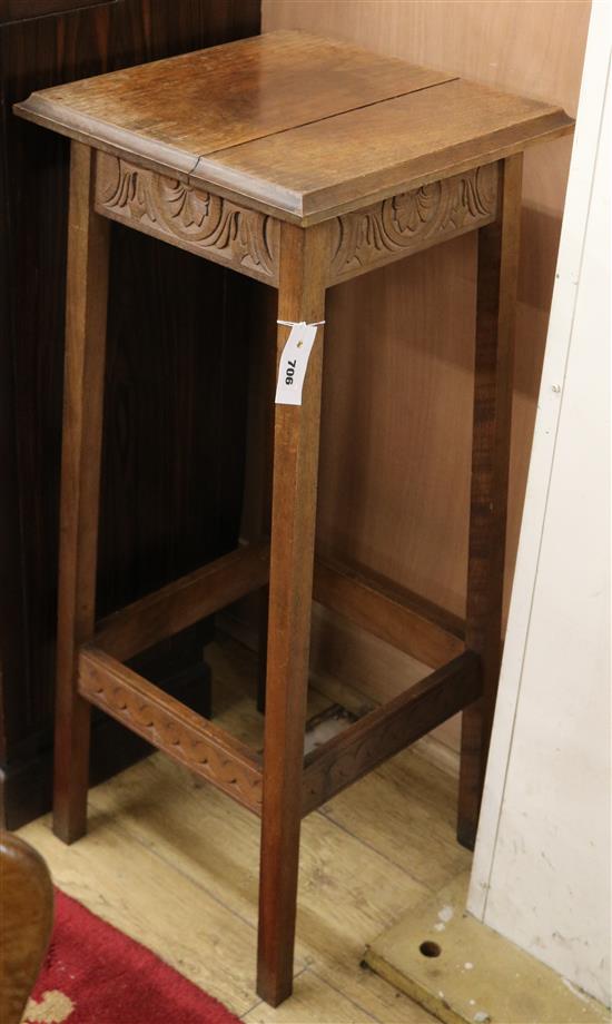 Attributed to Alfred Waterhouse. An oak jardiniere table, with moulded rectangular top and carved frieze, on W.1ft 3in.